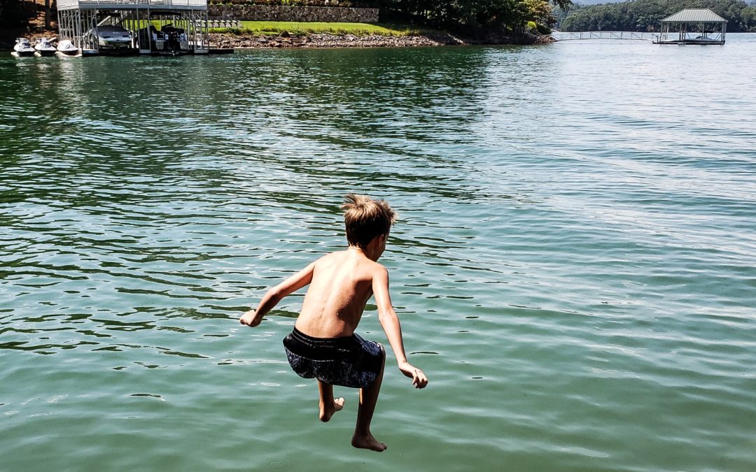 summertime-cool-down-at-the-lake-when-young-kid